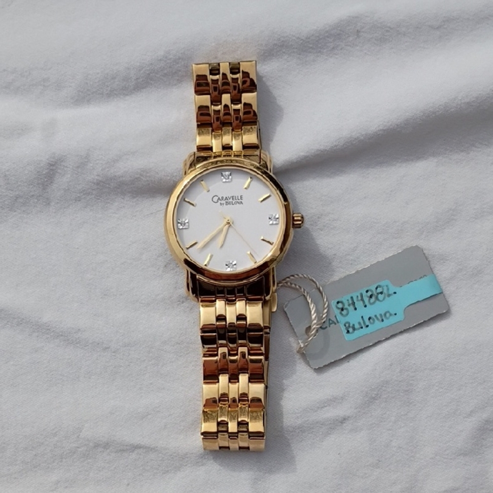 Caravelle by Bulova Gold Link Bracelet Watch White Dial Crystal Stainless Steel